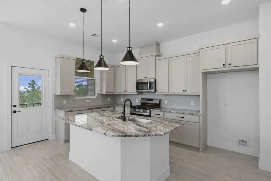 Representative furnished interior of a home built from the Margaux by Chesmar Homes in Bridgeland Chateau, Cypress (Image 9).