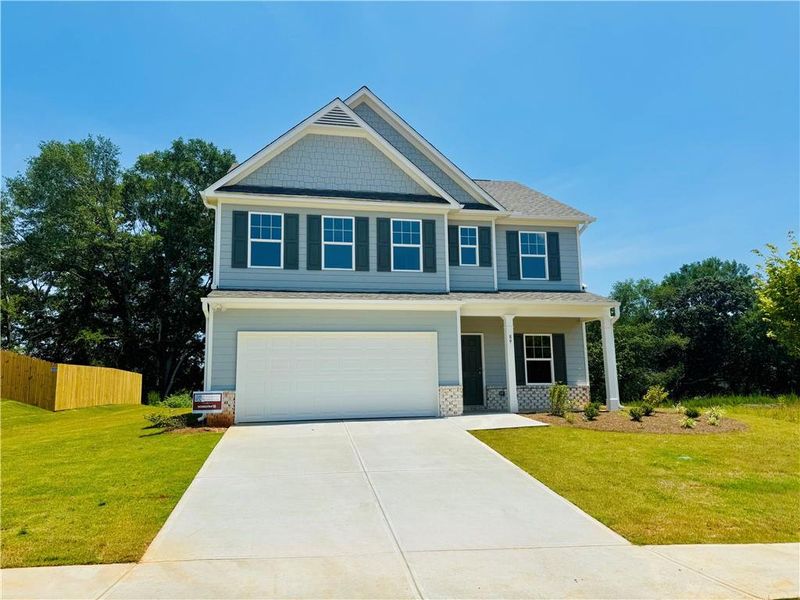 Front exterior of a new home in , Jefferson, GA, highlighting curb appeal (Image 14).