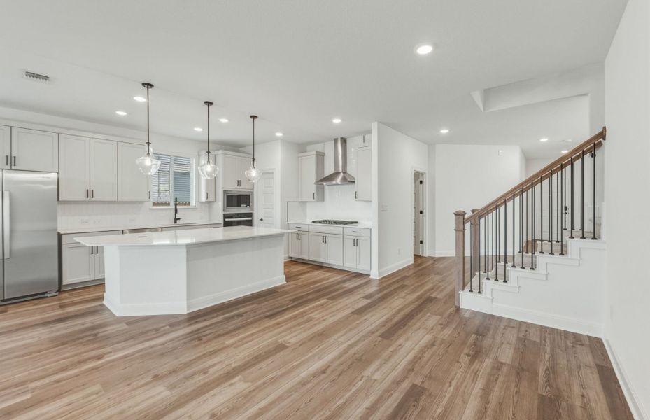 Representative furnished interior of a home built from the Woodland by Pulte Homes in Santa Rita Ranch, Liberty Hill (Image 7).