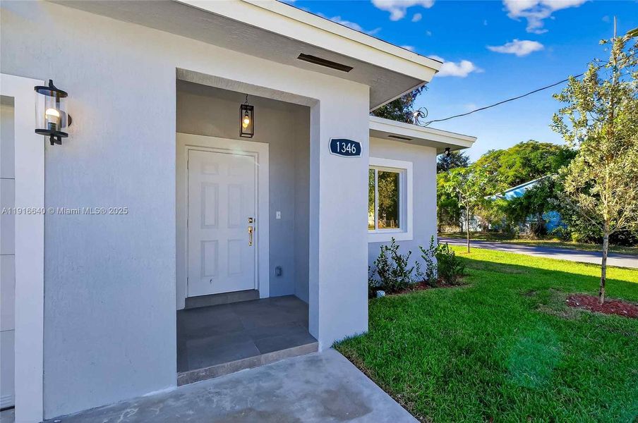 Exterior details and patio area of a home in , Miami (Image 20). Exterior details and patio area of a home in , Miami (Image 20).