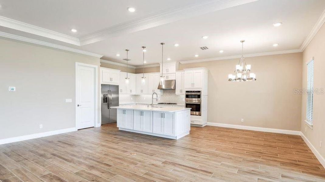Furnished interior view inside a new home in Esplanade at Westview, Kissimmee (Image 8). Furnished interior view inside a new home in Esplanade at Westview, Kissimmee (Image 8).
