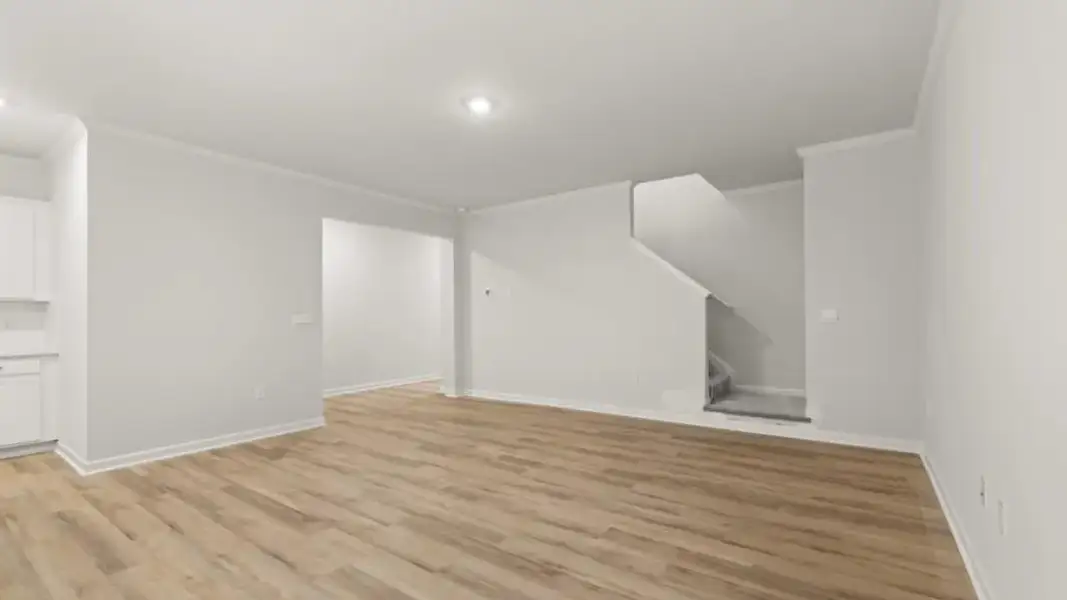 Spacious, unfurnished interior of a new home in Waypoint, Flowery Branch (Image 16).