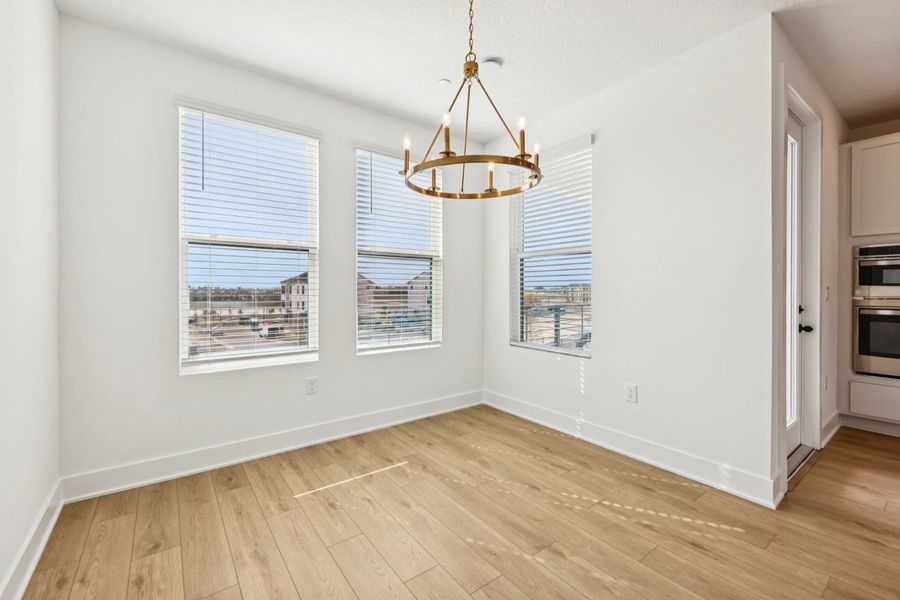 Spacious, unfurnished interior of a new home in Parkview at Hamlin, Winter Garden (Image 15).