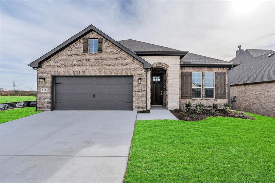 Front exterior of a new home in Waterford Park, Weatherford, TX, highlighting curb appeal (Image 19).