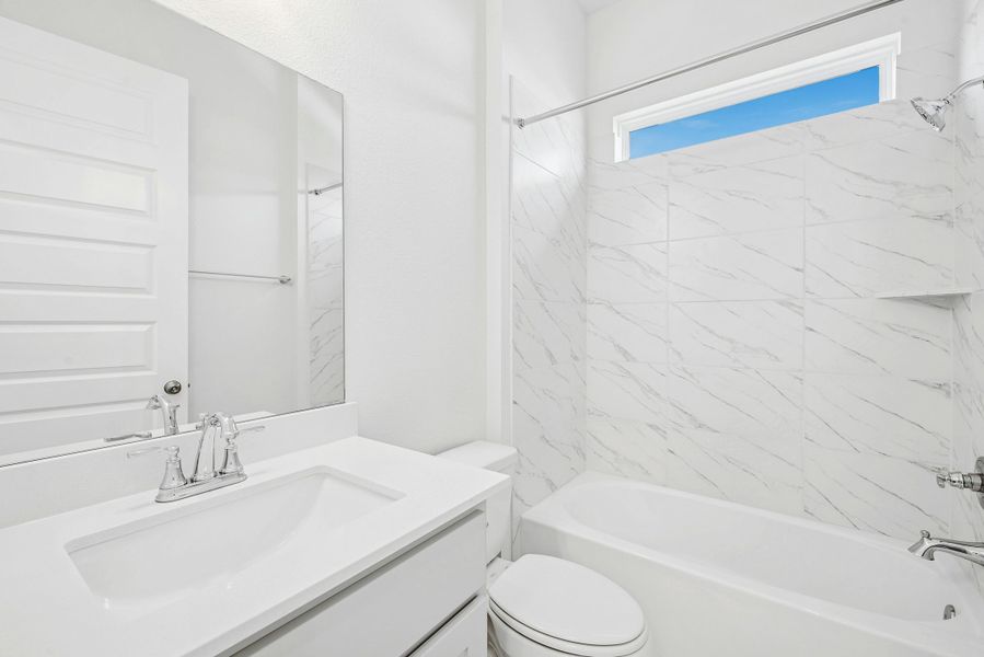 Furnished interior view inside a new home in The Colony, Bastrop (Image 13). Furnished interior view inside a new home in The Colony, Bastrop (Image 13).