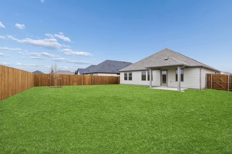Covered Patio in the Emmy II home plan by Trophy Signature Homes - REPRESENTATIVE PHOTO