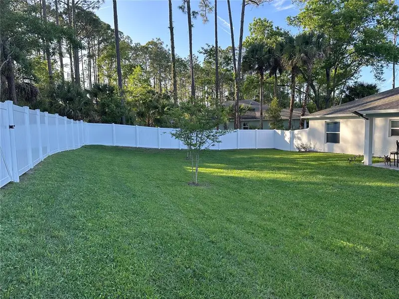 Exterior details and patio area of a home in Palm Coast, Palm Coast (Image 3).