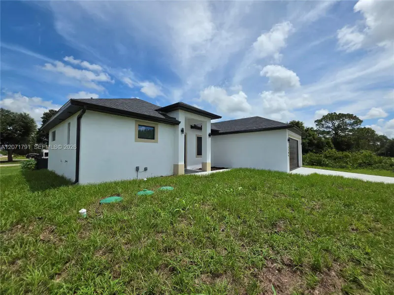 Exterior details and patio area of a home in , Lehigh Acres (Image 23).