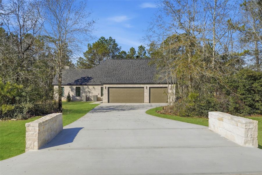 Front exterior of a new home in , Montgomery, TX, highlighting curb appeal (Image 29).