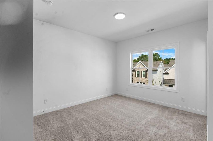 Spacious, unfurnished interior of a new home in Evanshire Townhomes, Duluth (Image 29).