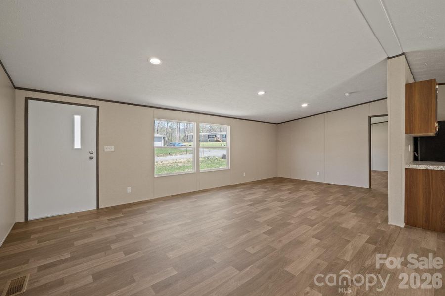 Spacious, unfurnished interior of a new home in , Old Fort (Image 11).