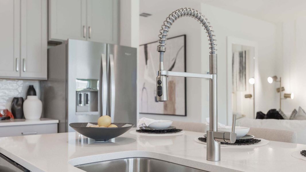 Representative furnished interior of a home built from the DELRAY by D.R. Horton in Lakes of Mount Dora, Mount Dora (Image 14).
