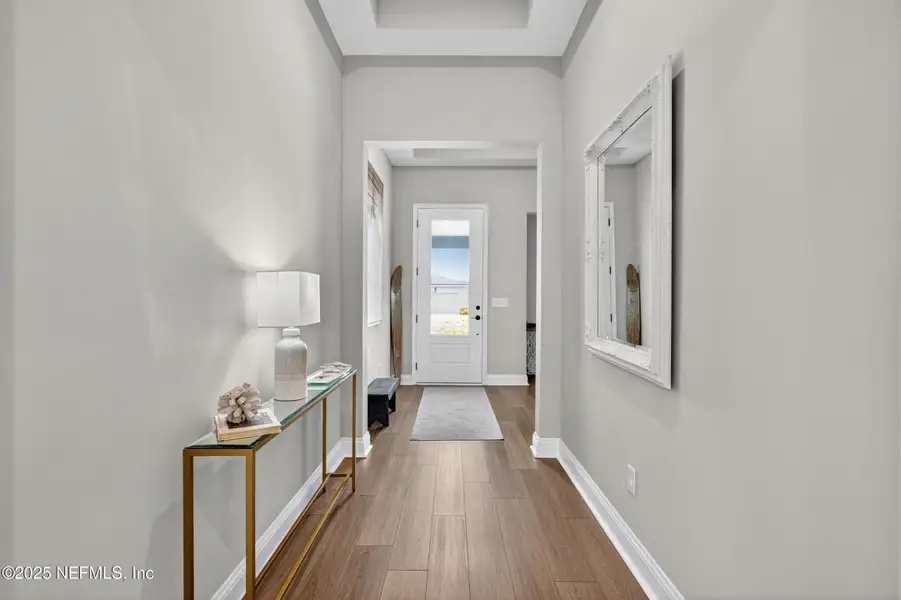 Furnished interior view inside a new home in RiverTown - WaterSong, St. Johns (Image 5).