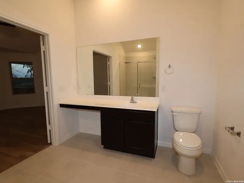 Furnished interior view inside a new home in Cinco Lakes, San Antonio (Image 7).