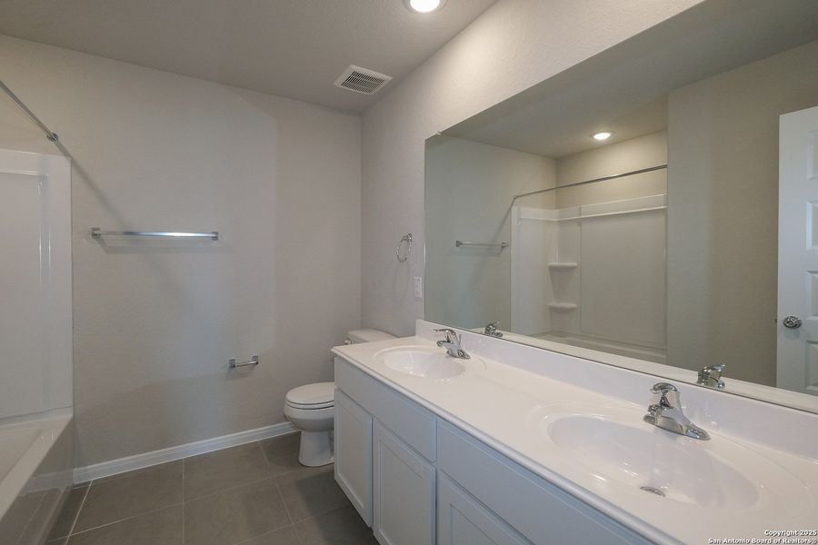 Furnished interior view inside a new home in Paloma Park, Converse (Image 11).