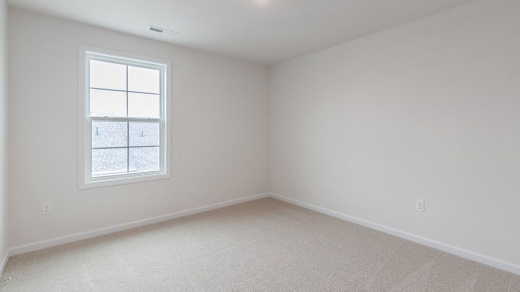 Representative unfurnished interior of a home built from the Savannah by D.R. Horton in The Meadows at Kinsley, Jamestown (Image 19).