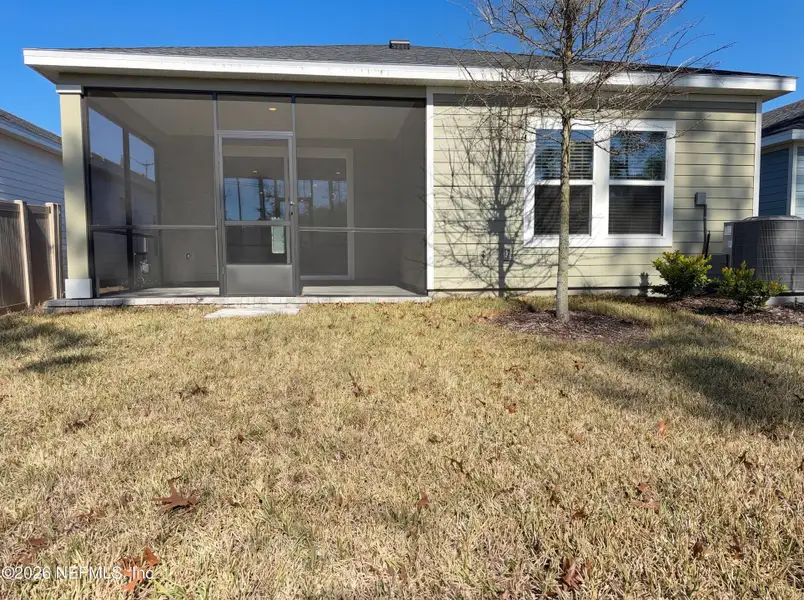 Exterior details and patio area of a home in , St. Johns (Image 3).