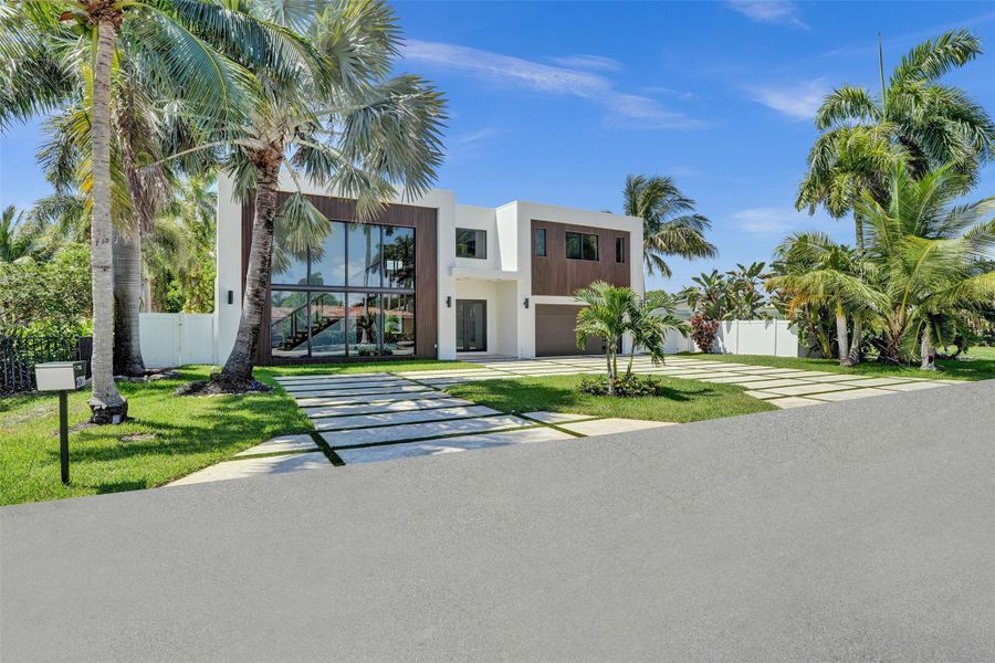 Front exterior of a new home in , Lighthouse Point, FL, highlighting curb appeal (Image 25).