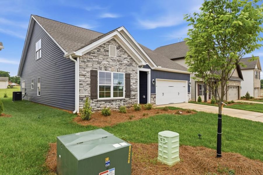 Front exterior of a new home in Sullivans Reserve, Walkertown, NC, highlighting curb appeal (Image 31).