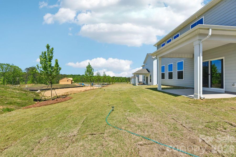 Exterior details and patio area of a home in Westport, York (Image 3).