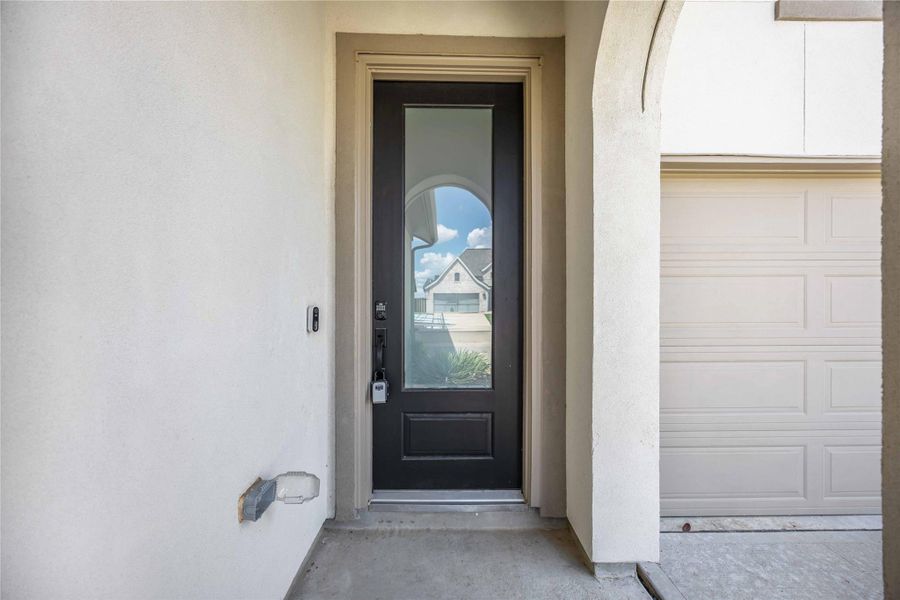 Exterior details and patio area of a home in Elyson 45' & 70', Katy (Image 4).