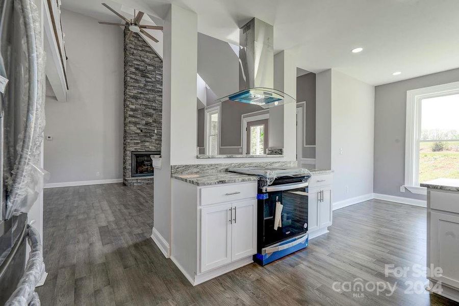 KITCHEN VIEW TO LIVING ROOM