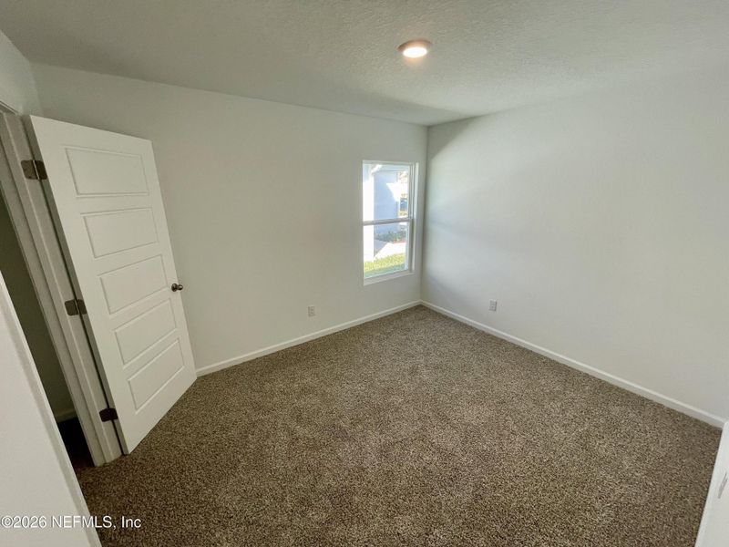 Spacious, unfurnished interior of a new home in Grand Reserve, Bunnell (Image 22).