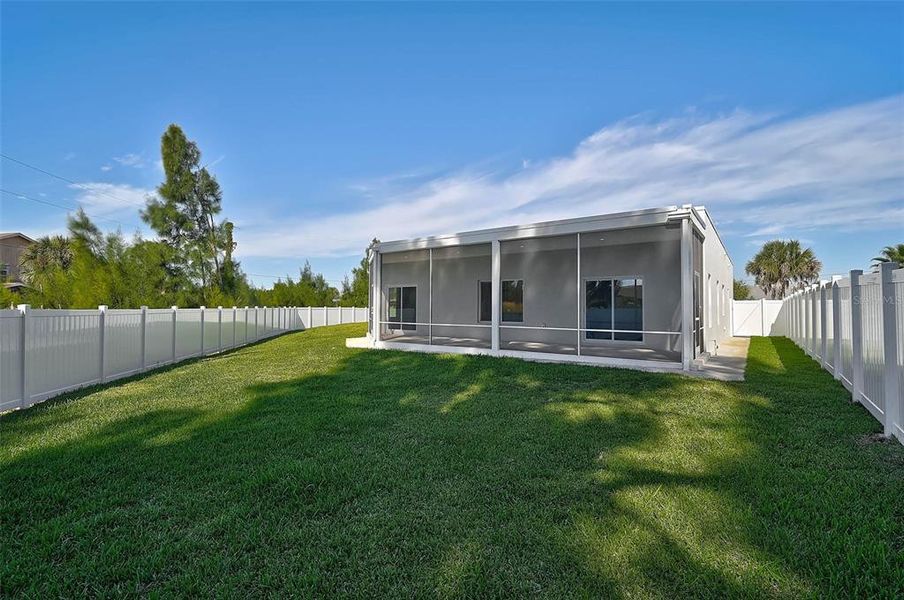 Exterior details and patio area of a home in , North Port (Image 26).