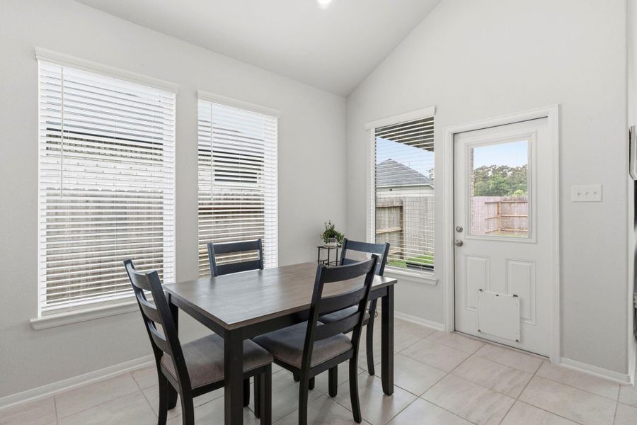 Start your mornings with sunshine and coffee in this bright dining space overlooking the backyard. Start your mornings with sunshine and coffee in this bright dining space overlooking the backyard.