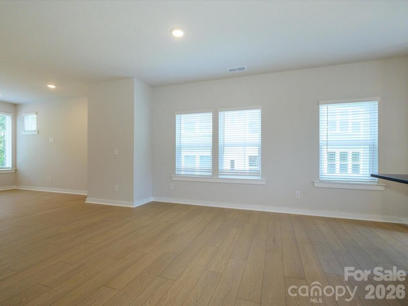 Spacious, unfurnished interior of a new home in Central Living at Craig, Charlotte (Image 19).
