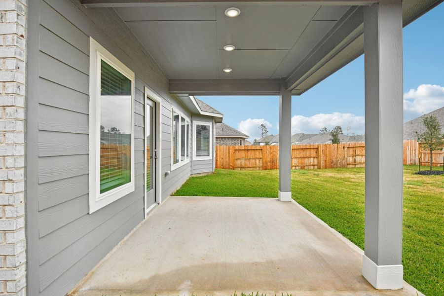 Exterior details and patio area of a home in Pine Lake Cove - Classic Series, Montgomery (Image 25).