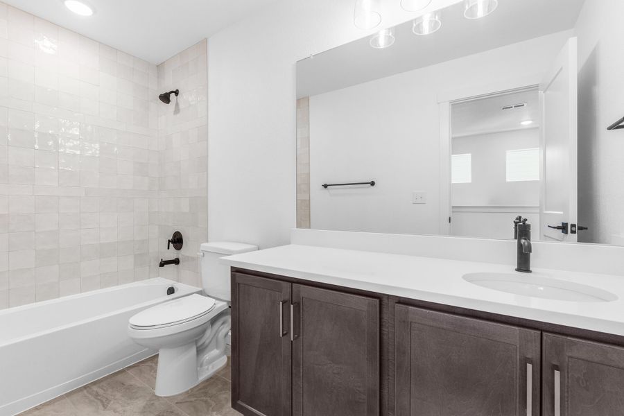 Representative furnished interior of a home built from the Bloom Series - Wallflower by Brightland Homes in Granary, Johnstown (Image 19). Representative furnished interior of a home built from the Bloom Series - Wallflower by Brightland Homes in Granary, Johnstown (Image 19).