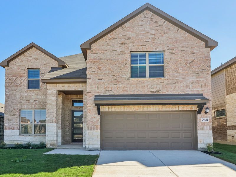 Front exterior of the Cedar floorplan at a Meritage Homes community.