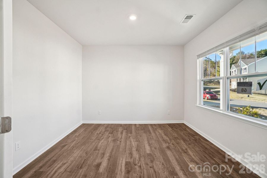 Spacious, unfurnished interior of a new home in Rydele Heights, Asheville (Image 33).