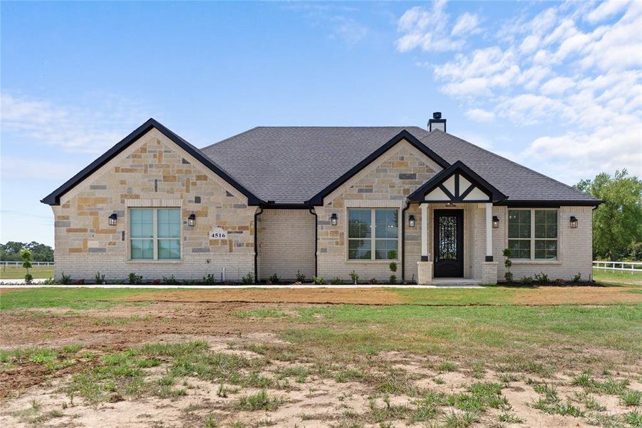 Front exterior of a new home in , Cumby, TX, highlighting curb appeal (Image 2). Front exterior of a new home in , Cumby, TX, highlighting curb appeal (Image 2).