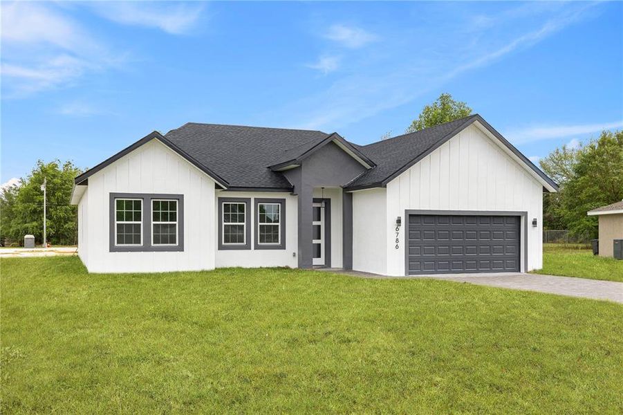 Front exterior of a new home in , Ocala, FL, highlighting curb appeal (Image 20).