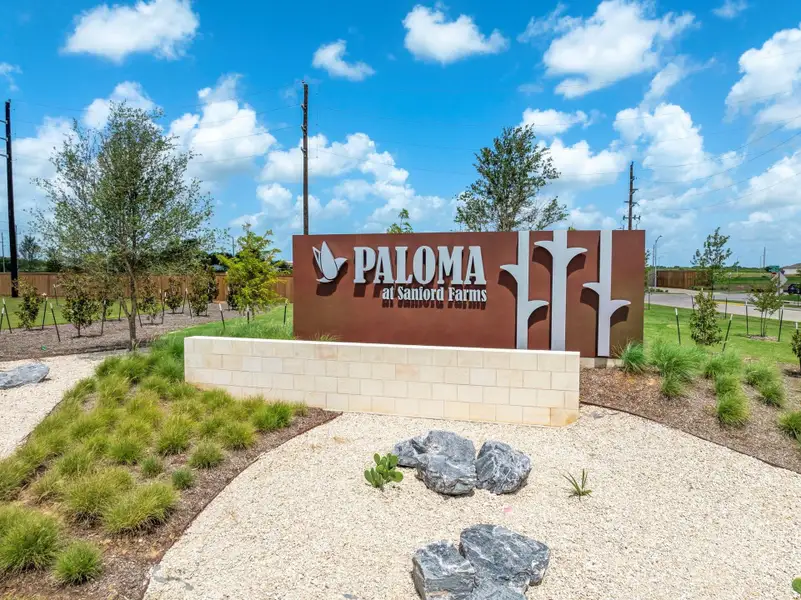 Front exterior of a new home in Lonestar Collection at Paloma at Sanford Farms, Waller, TX, highlighting curb appeal (Image 1).