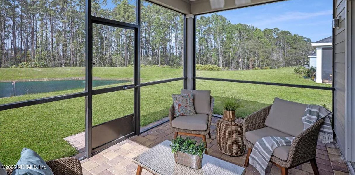 Furnished interior view inside a new home in Edenbrooke at Hyland Trail | 55+: Edenbrooke at Hyland Trail 50s, Green Cove Springs (Image 25).