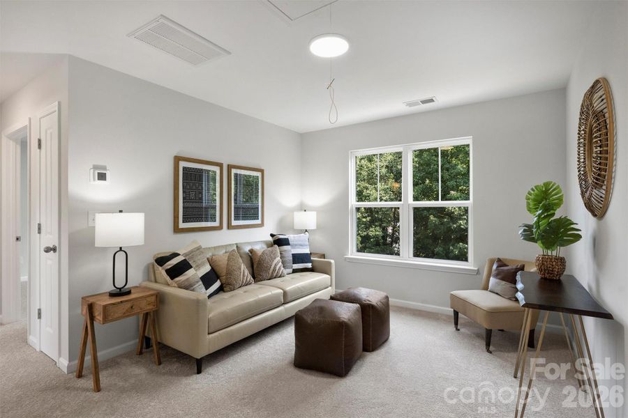 Second level area at the top of the stairs, ideal for flex space or open office.