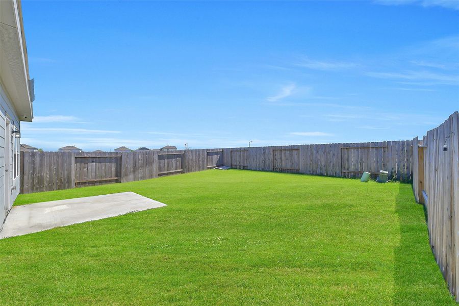 Exterior details and patio area of a home in Barrett Crossing, Crosby (Image 3).
