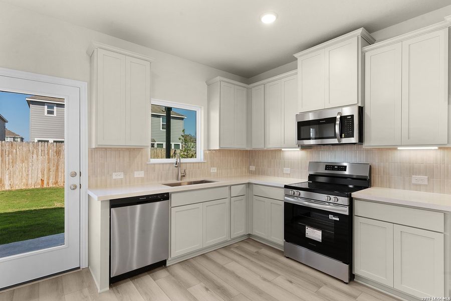 Furnished interior view inside a new home in Casinas at Gruene, New Braunfels (Image 5).