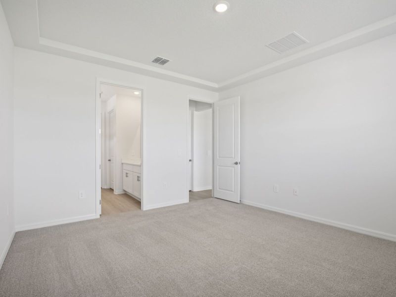 Spacious, unfurnished interior of a new home in Coasterra - Reserve Series, Palmetto (Image 13).