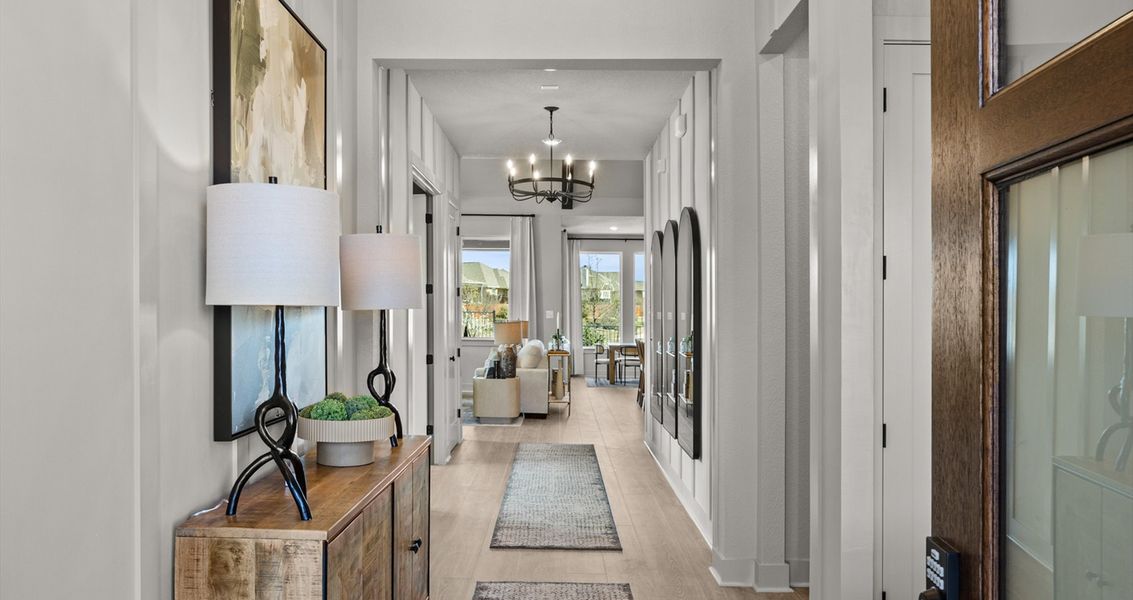 Representative furnished interior of a home built from the Malia by Chesmar Homes in 6 Creeks, Kyle (Image 3).