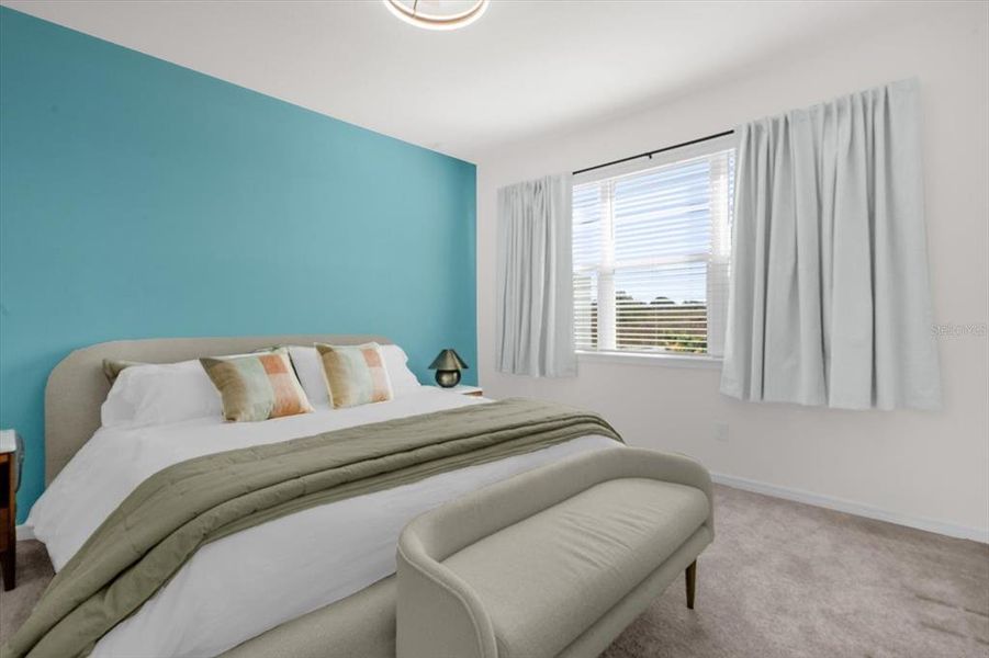 Furnished interior view inside a new home in Tohoqua Reserve, Kissimmee (Image 12).