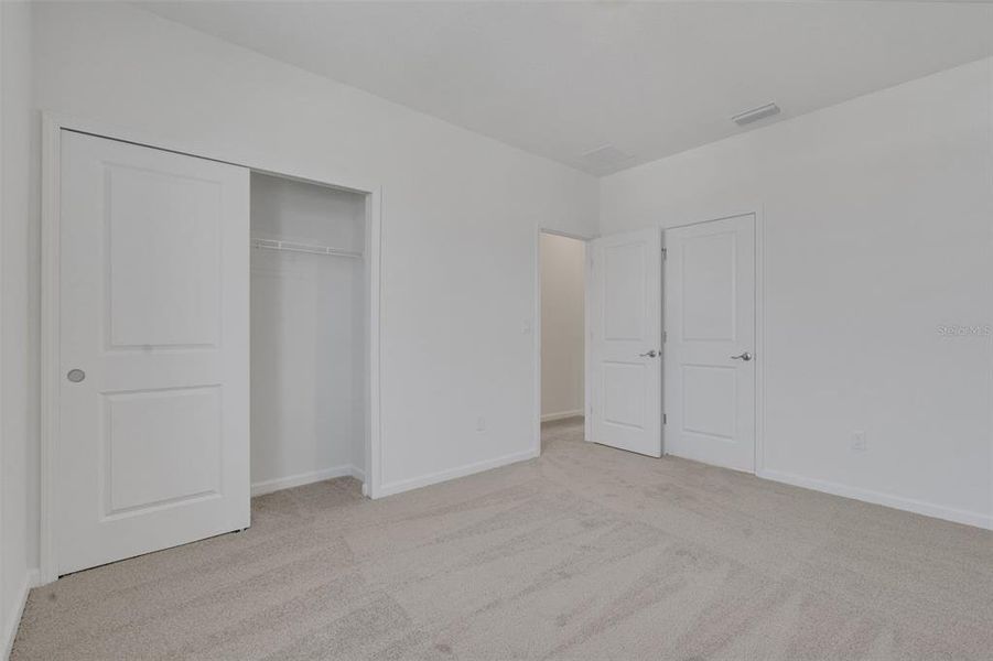 Spacious, unfurnished interior of a new home in Brystol North at Wylder, Port St. Lucie (Image 25).
