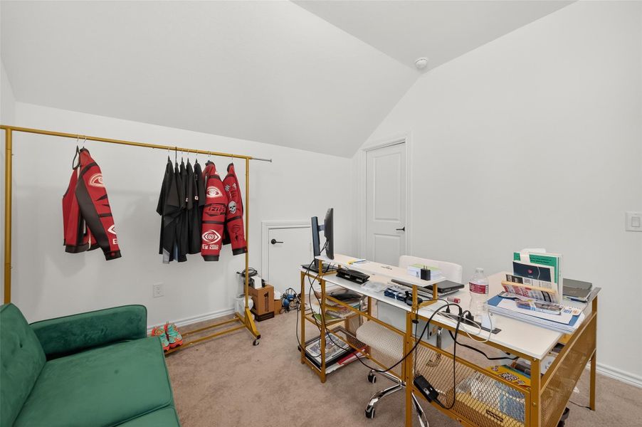 Furnished interior view inside a new home in Sunterra, Katy (Image 18).