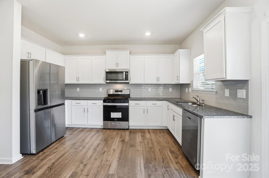 Furnished interior view inside a new home in , Charlotte (Image 8). Furnished interior view inside a new home in , Charlotte (Image 8).