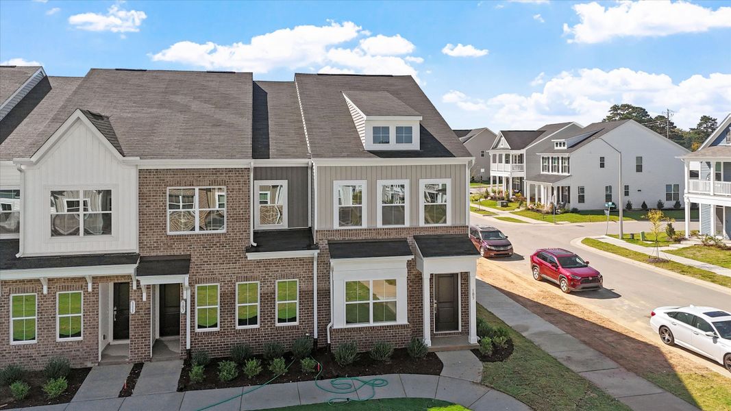 Front exterior of a new home in Renaissance at White Oak, Garner, NC, highlighting curb appeal (Image 17).