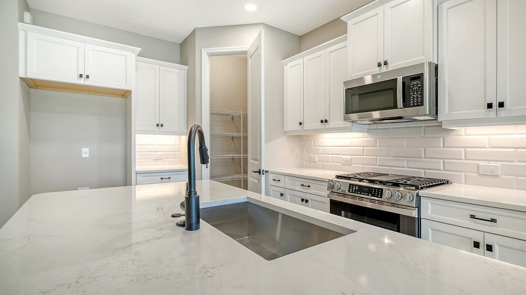Furnished interior view inside a new home in Vicenza Real Estate and Homes for Sale in North Venice, FL - Neal Communities, Venice (Image 9).