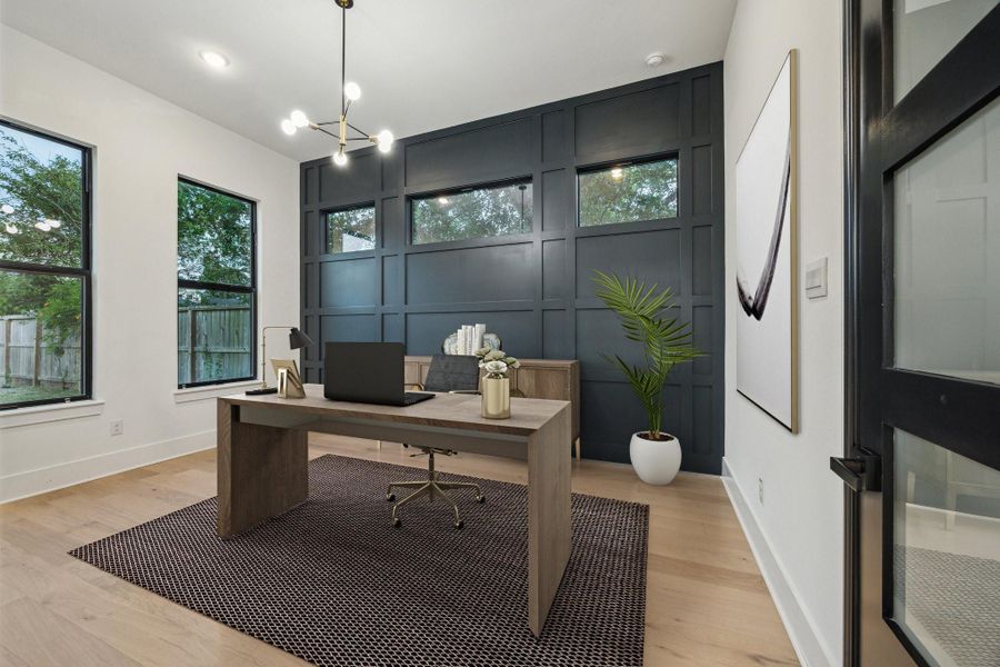 The home office is multi-functional. With a closet and full bath adjacent, it can serve as a second downstairs guest bedroom *this photo has been virtually staged The home office is multi-functional. With a closet and full bath adjacent, it can serve as a second downstairs guest bedroom *this photo has been virtually staged